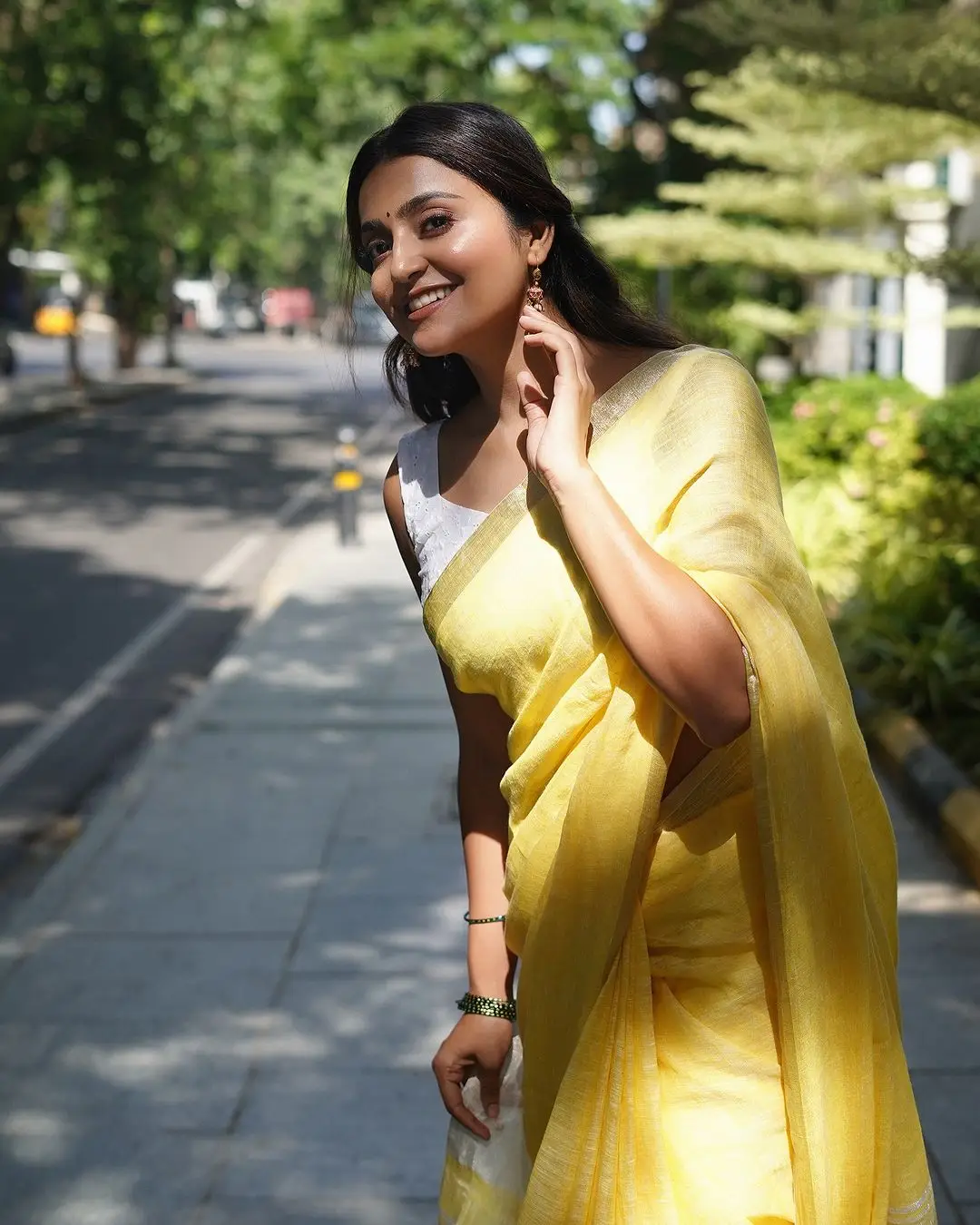 Avantika Mishra Stills in Yellow Saree White Sleeveless Blouse